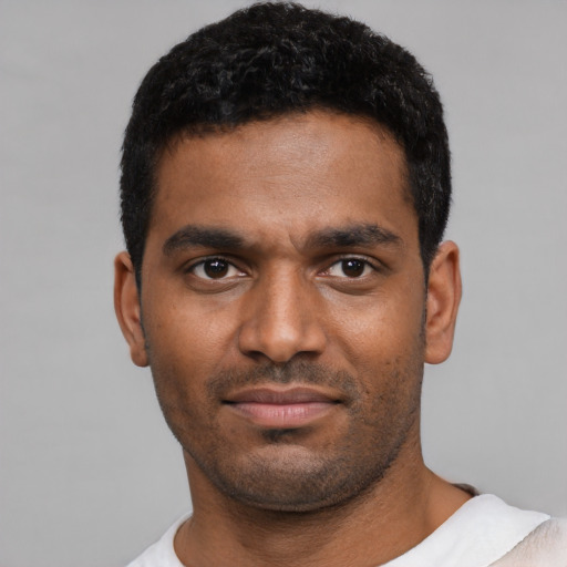 Neutral black young-adult male with short  black hair and brown eyes