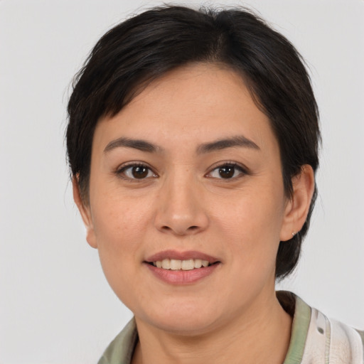 Joyful white young-adult female with medium  brown hair and brown eyes