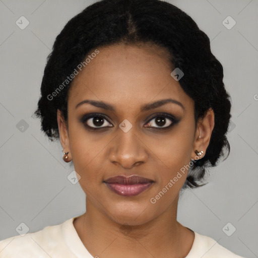 Joyful black young-adult female with short  black hair and brown eyes