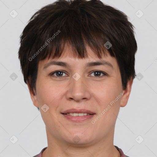 Joyful white young-adult female with short  brown hair and brown eyes