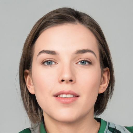 Neutral white young-adult female with medium  brown hair and green eyes