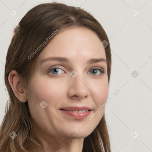 Joyful white young-adult female with long  brown hair and blue eyes