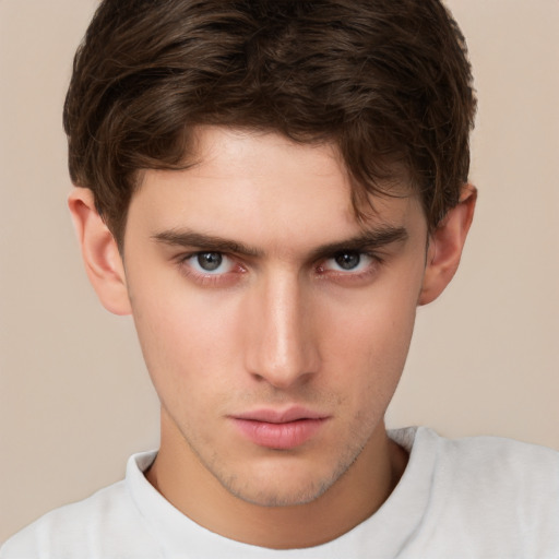 Neutral white young-adult male with short  brown hair and brown eyes