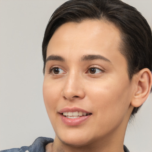 Joyful white young-adult female with medium  brown hair and brown eyes