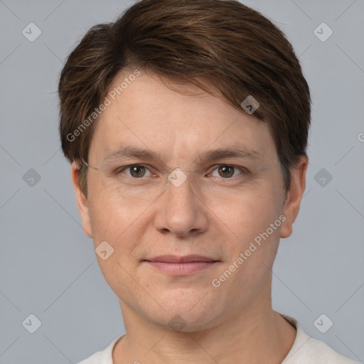 Joyful white adult male with short  brown hair and grey eyes