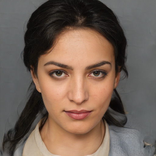 Joyful white young-adult female with medium  brown hair and brown eyes