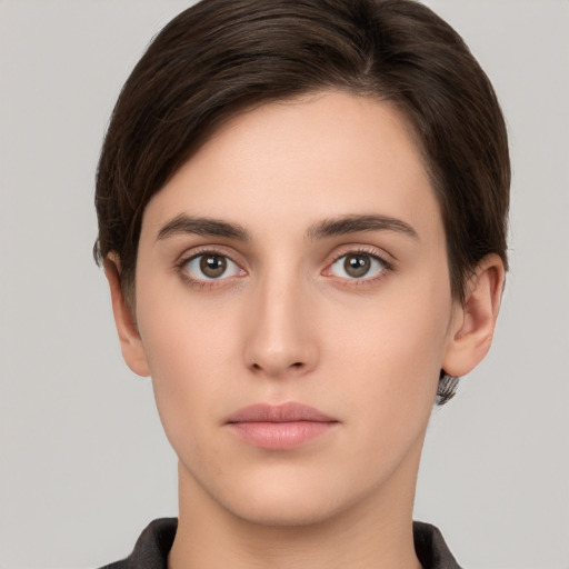 Neutral white young-adult female with short  brown hair and brown eyes