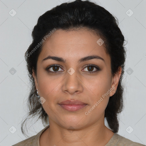 Joyful latino young-adult female with medium  brown hair and brown eyes