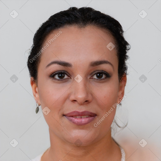 Joyful latino young-adult female with short  brown hair and brown eyes