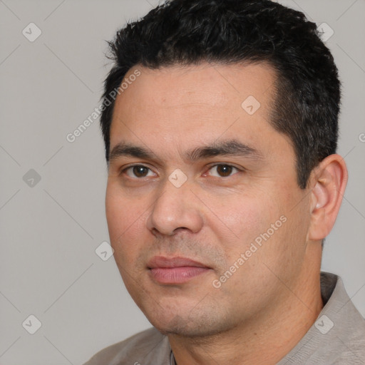 Joyful white young-adult male with short  black hair and brown eyes