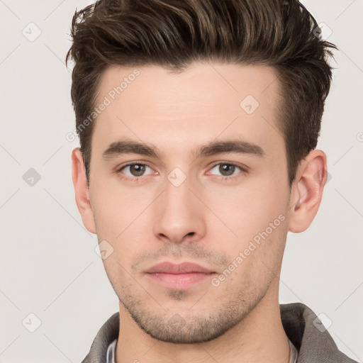 Neutral white young-adult male with short  brown hair and brown eyes