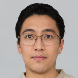 Neutral asian young-adult male with short  black hair and brown eyes