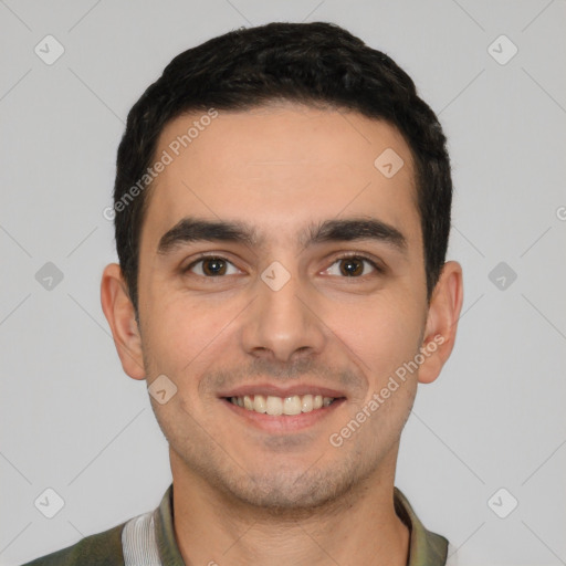 Joyful white young-adult male with short  black hair and brown eyes