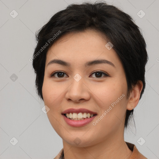 Joyful asian young-adult female with medium  black hair and brown eyes