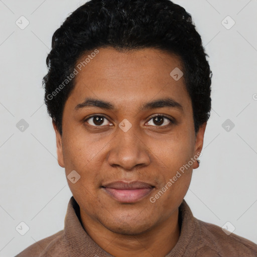 Joyful black young-adult male with short  black hair and brown eyes