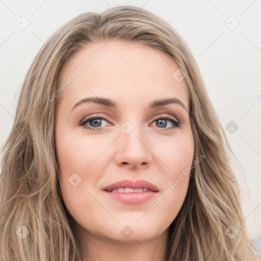 Joyful white young-adult female with long  brown hair and blue eyes