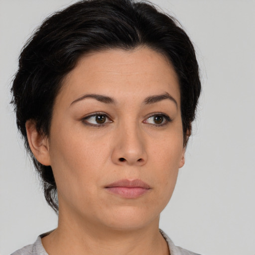 Neutral asian young-adult female with short  brown hair and brown eyes