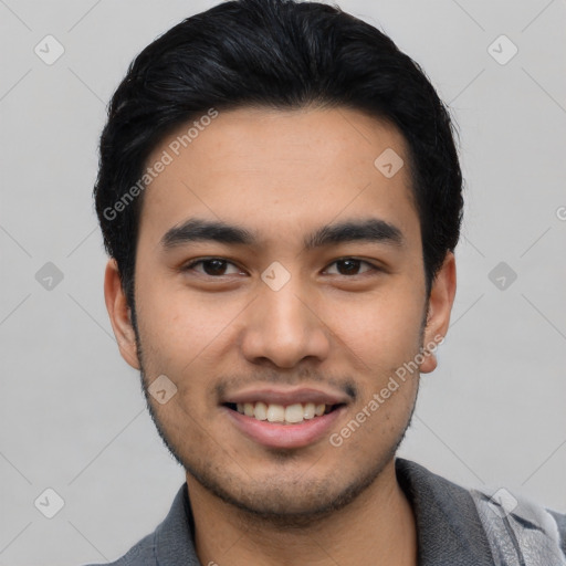 Joyful asian young-adult male with short  black hair and brown eyes