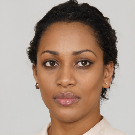Neutral black young-adult female with short  black hair and brown eyes