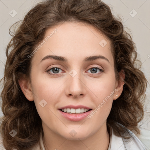 Joyful white young-adult female with medium  brown hair and green eyes