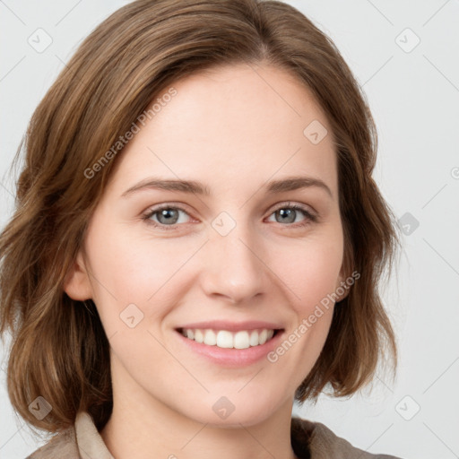 Joyful white young-adult female with medium  brown hair and green eyes