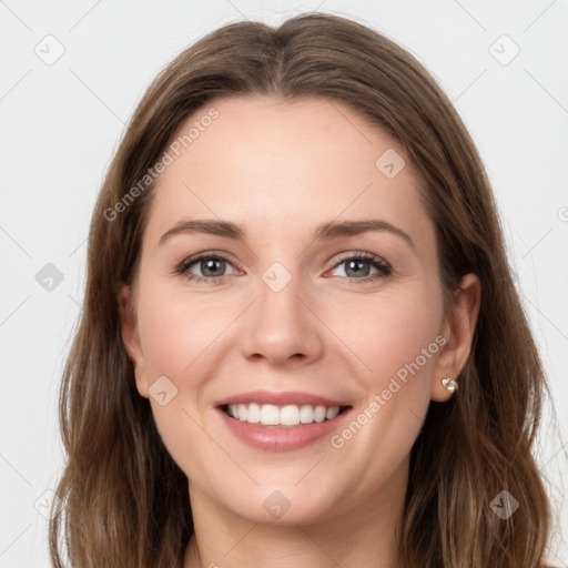 Joyful white young-adult female with long  brown hair and grey eyes