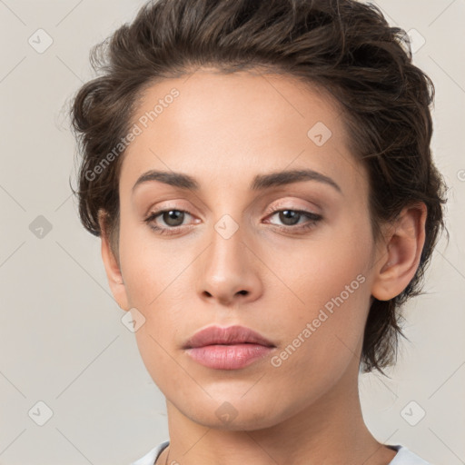 Neutral white young-adult female with medium  brown hair and brown eyes