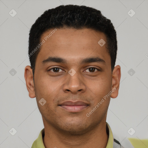 Joyful latino young-adult male with short  brown hair and brown eyes