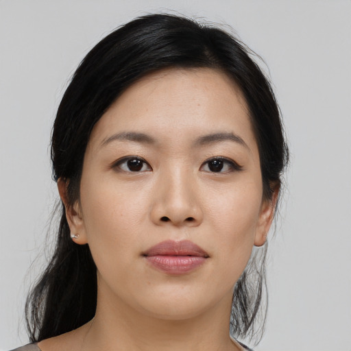 Neutral asian young-adult female with medium  black hair and brown eyes