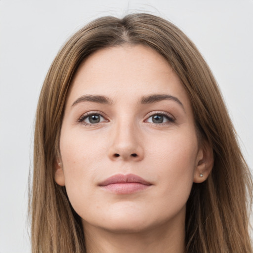 Neutral white young-adult female with long  brown hair and grey eyes