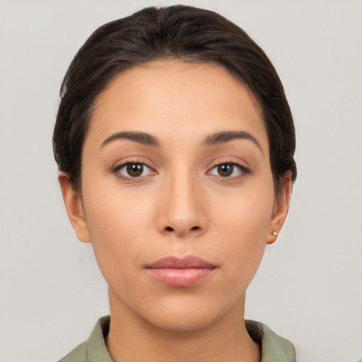 Neutral white young-adult female with short  brown hair and brown eyes