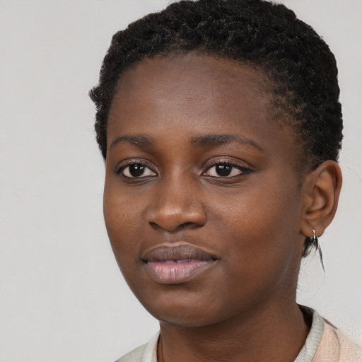 Neutral black young-adult female with short  black hair and brown eyes