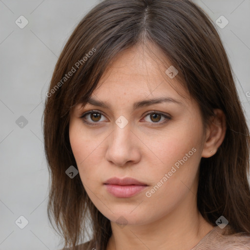 Neutral white young-adult female with medium  brown hair and brown eyes