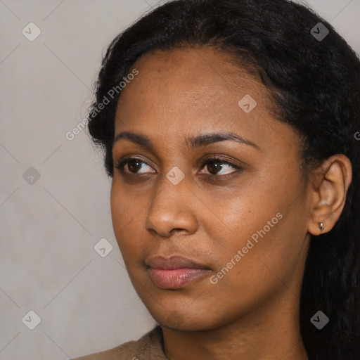 Neutral black young-adult female with long  black hair and brown eyes