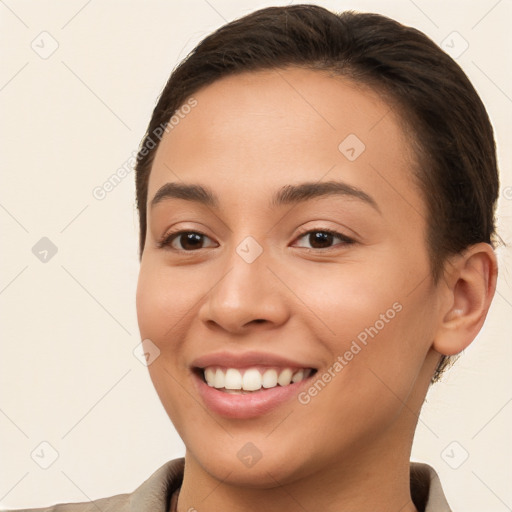 Joyful white young-adult female with short  brown hair and brown eyes