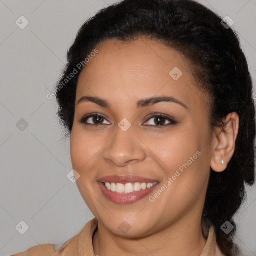 Joyful latino young-adult female with long  brown hair and brown eyes