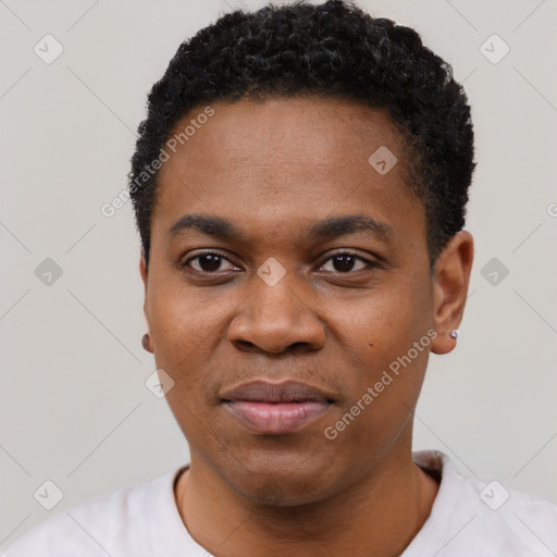 Joyful black young-adult male with short  black hair and brown eyes