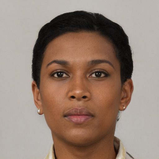 Neutral black young-adult female with short  black hair and brown eyes