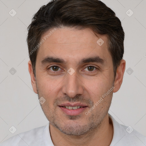 Joyful white young-adult male with short  brown hair and brown eyes