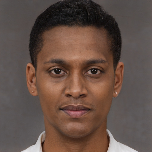 Neutral latino young-adult male with short  brown hair and brown eyes
