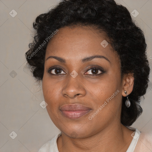 Joyful black young-adult female with medium  black hair and brown eyes