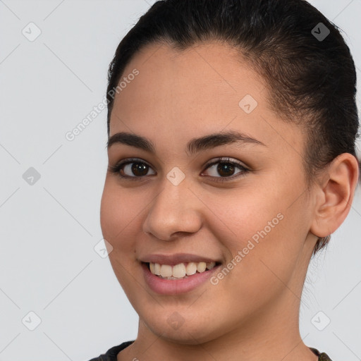 Joyful white young-adult female with short  brown hair and brown eyes