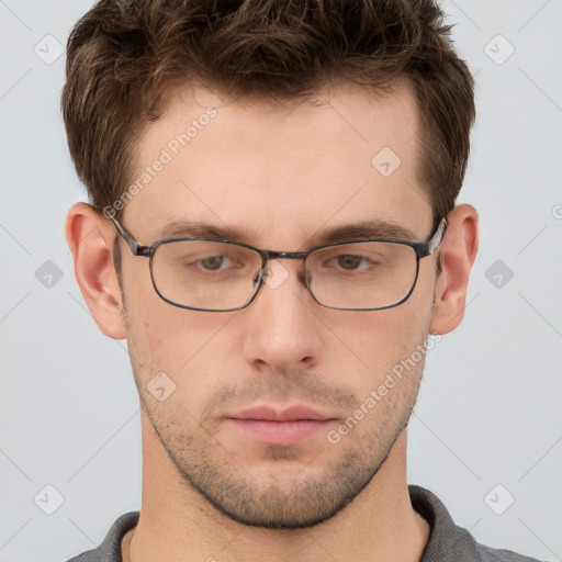 Neutral white young-adult male with short  brown hair and grey eyes