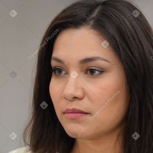 Neutral white young-adult female with long  brown hair and brown eyes