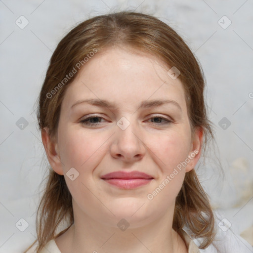 Joyful white young-adult female with medium  brown hair and blue eyes