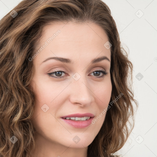 Joyful white young-adult female with long  brown hair and green eyes