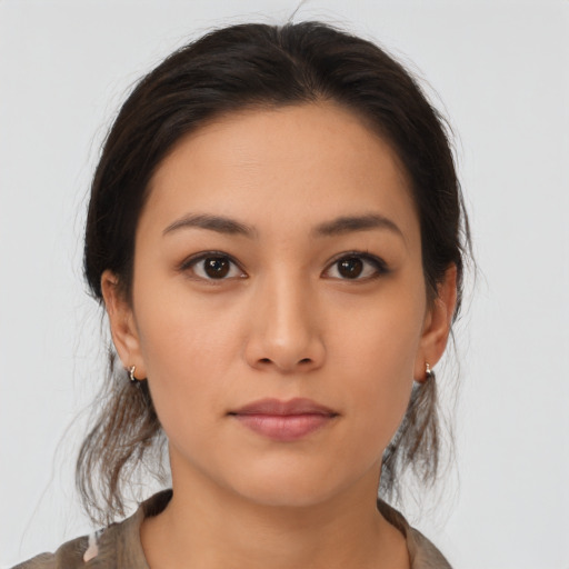 Neutral asian young-adult female with medium  brown hair and brown eyes