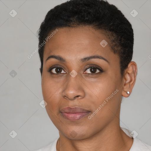 Joyful black young-adult female with short  brown hair and brown eyes