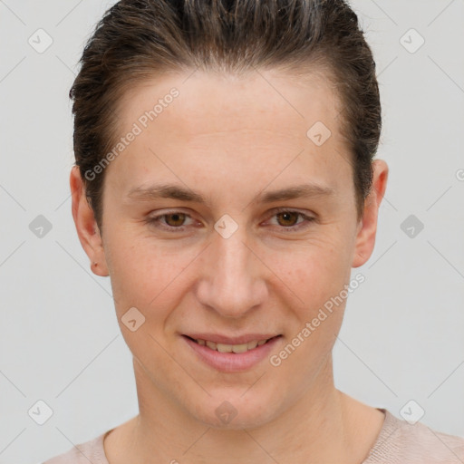 Joyful white adult female with short  brown hair and brown eyes