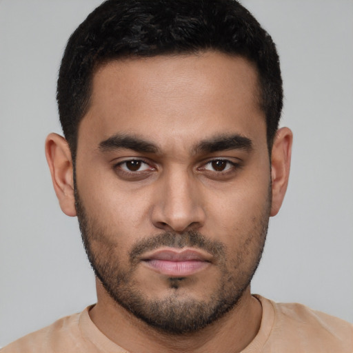 Neutral white young-adult male with short  black hair and brown eyes